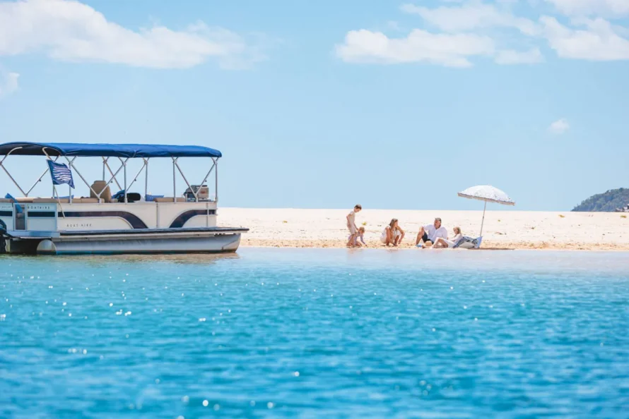 Family enjoying Noosa BBQ pontoon boat hire at the Noosa River mouth