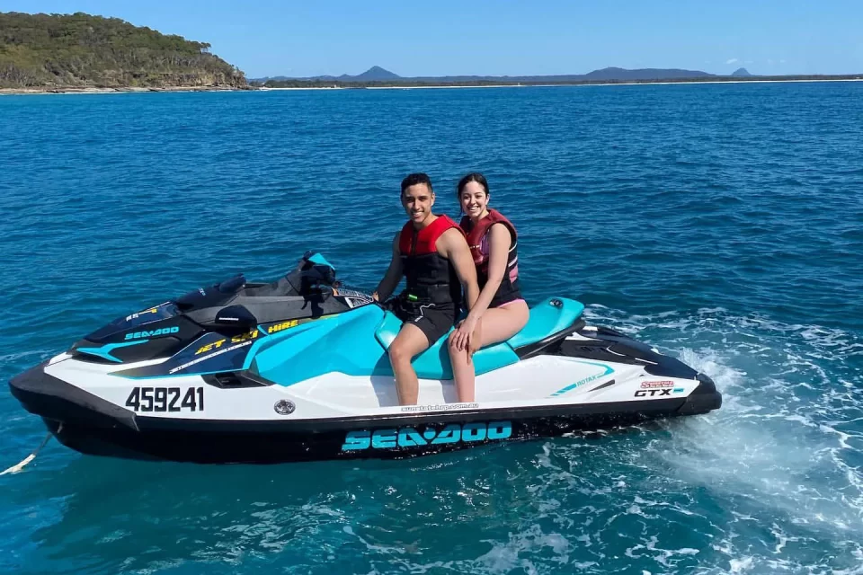 Couple enjoying a Noosa Jet Ski Ocean Tour with Terrace Marina